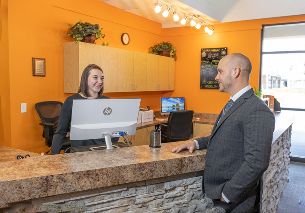 Chiropractor-Fort-Collins-CO-Todd-Leach-With-Team