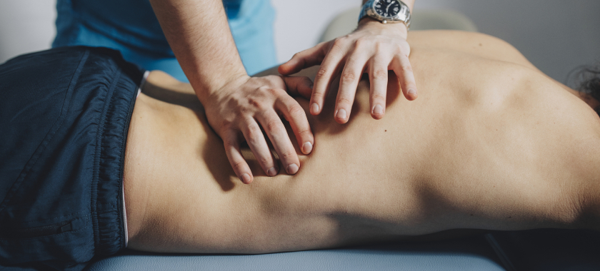a person receiving back massage